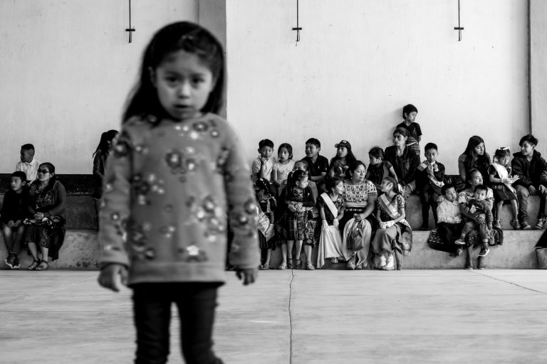 Street photo in Caserío Chutinamit, Guatemala by Duncan Aitken