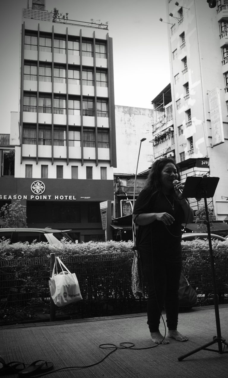Street photo in Lots, Malaysia by Chee Hiong Chua
