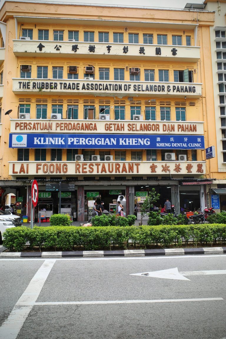 Street photo in Lots, Malaysia by Chee Hiong Chua