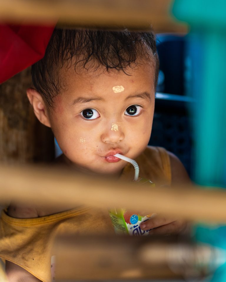 Street photo in Chiang Rai, Thailand by Mihalis Lindos