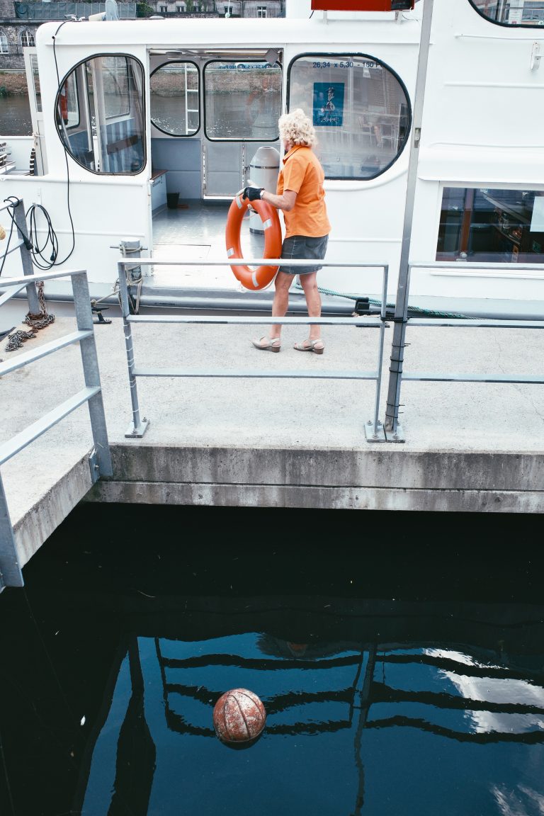 Street photo in Dinant, Belgium by Tim Schardt