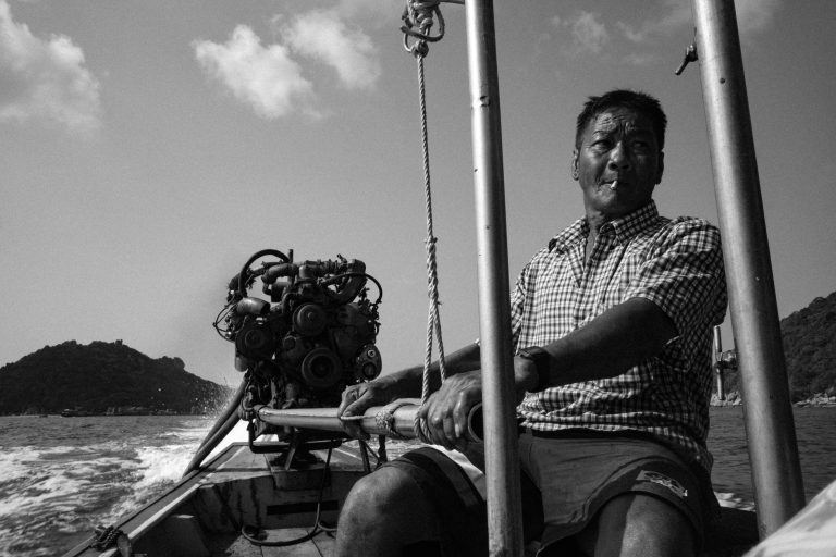 Street photo in Surat Thani, Thailand by Aleksei Korzov