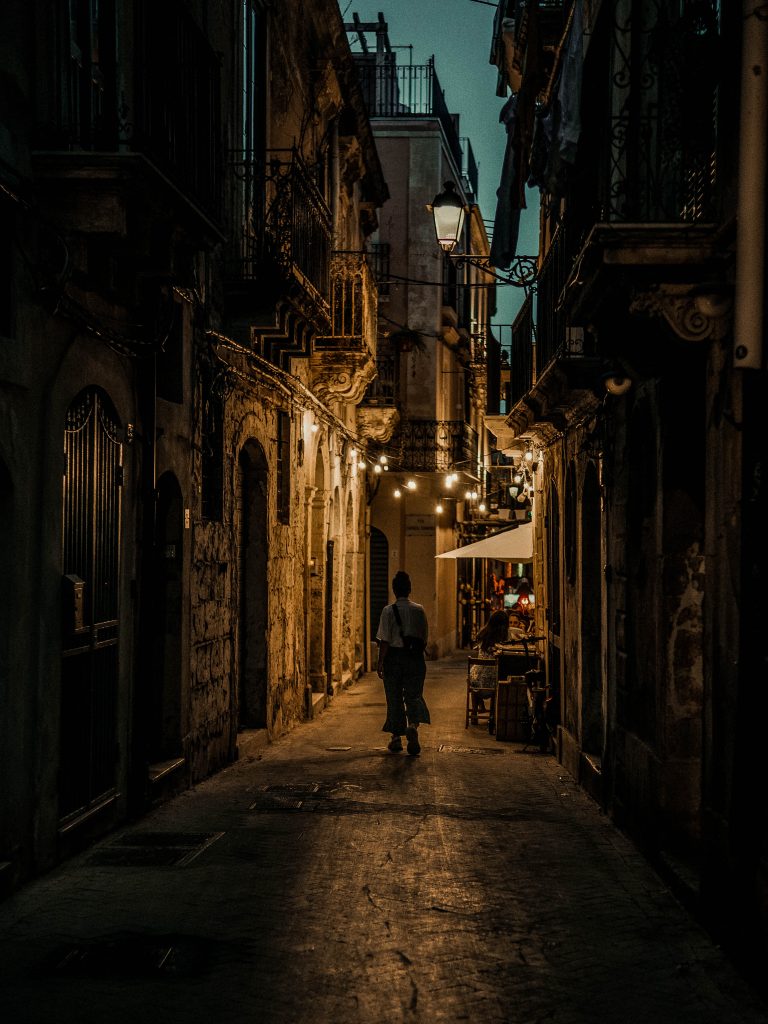 Street photo in Island of Ortigia, Italy by Teo Macauda