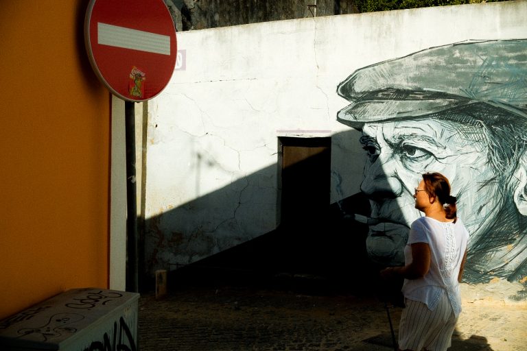Street photo in Lagos, Portugal by Ben Cooke