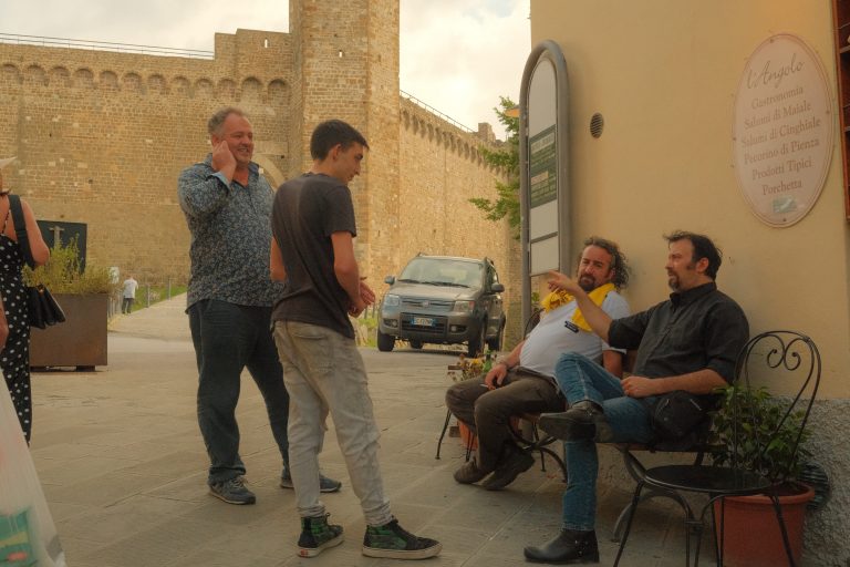 Street photo in Montalcino, Italy by kevin mccoy