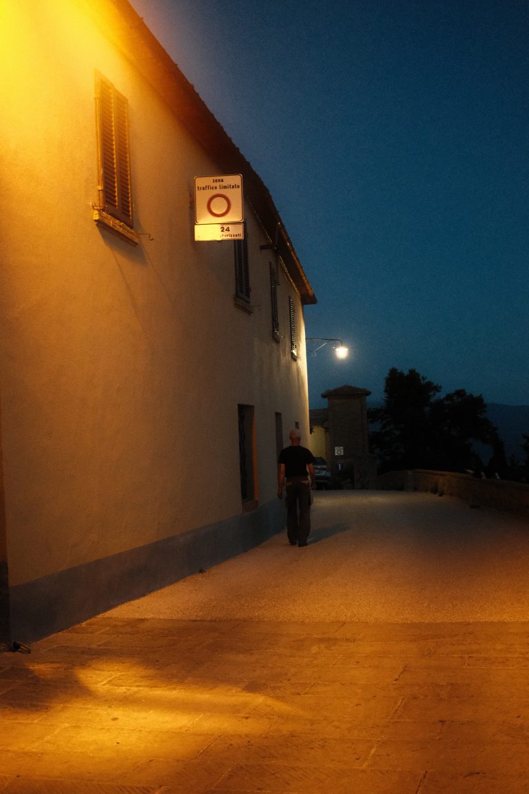 Street photo in Montalcino, Italy by kevin mccoy