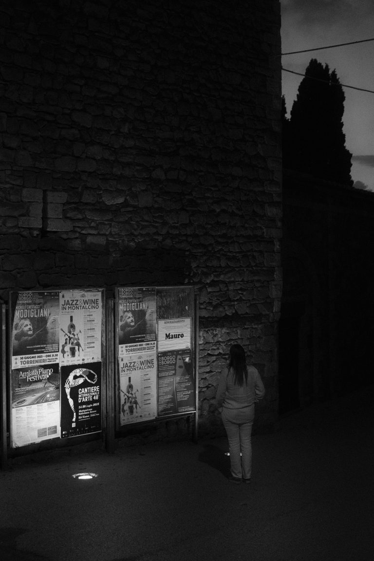 Street photo in Montalcino, Italy by kevin mccoy