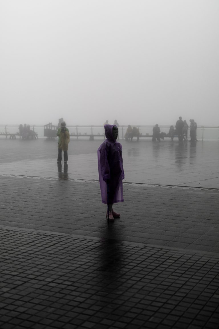 Street photo in Jiangjiajie, China by Jay SE1