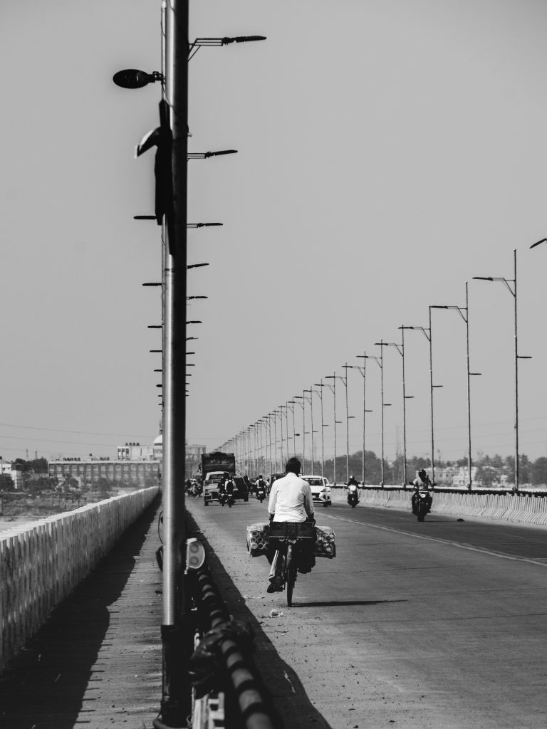 Street photo in Kuakhai River, India by Rushav Mohanty