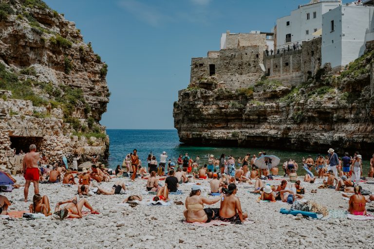 Street photo in Polignano a Mare, Italy by Alex Pler