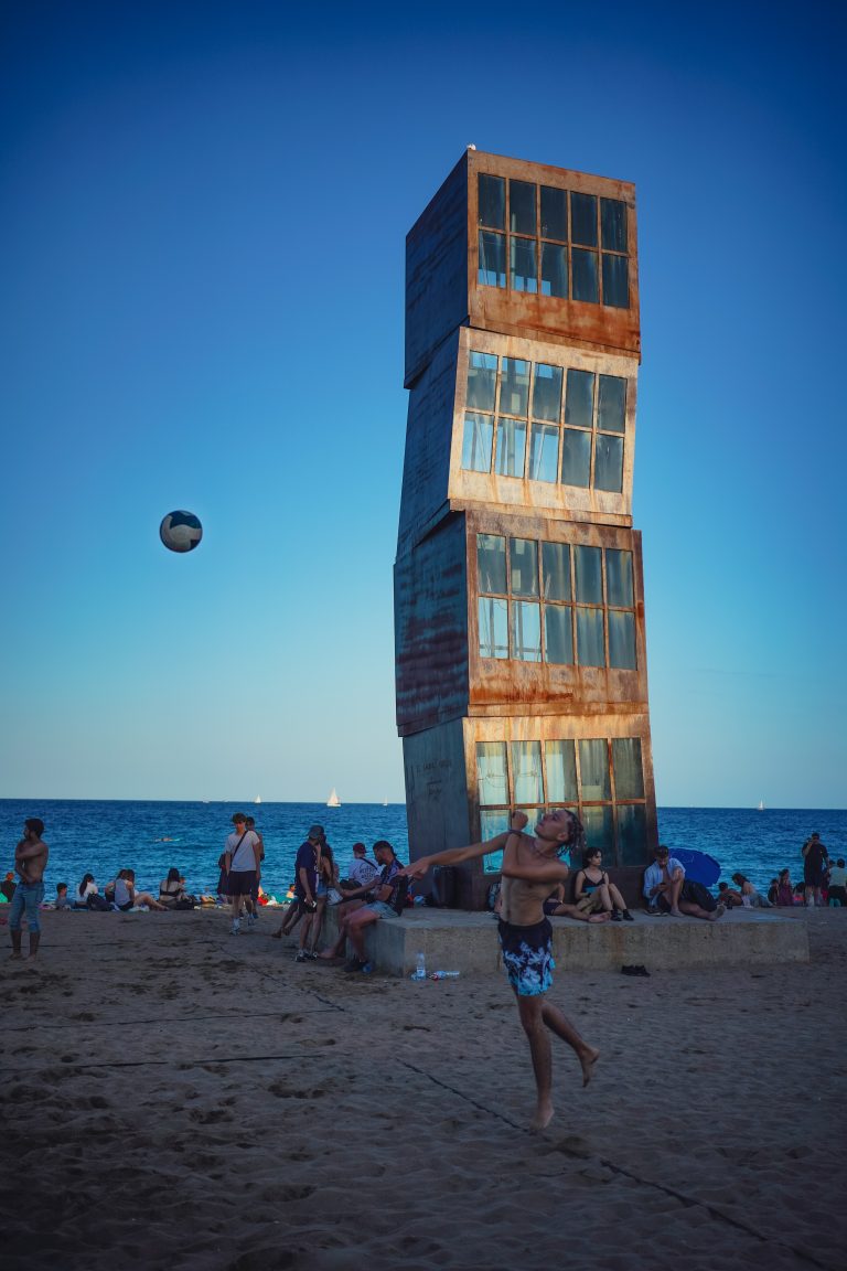 Street photo in Barceloneta Beach, Spain by Alex Pler