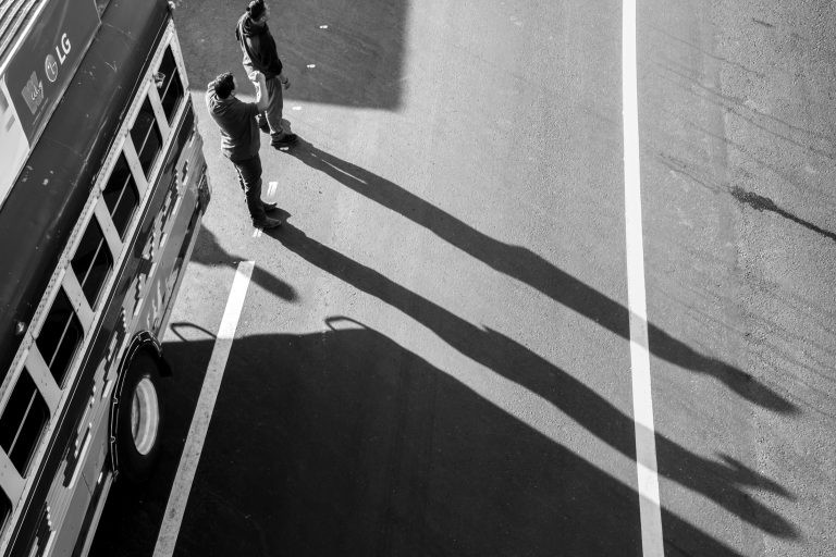 Street photo in Los Encuentros, Guatemala by Duncan Aitken