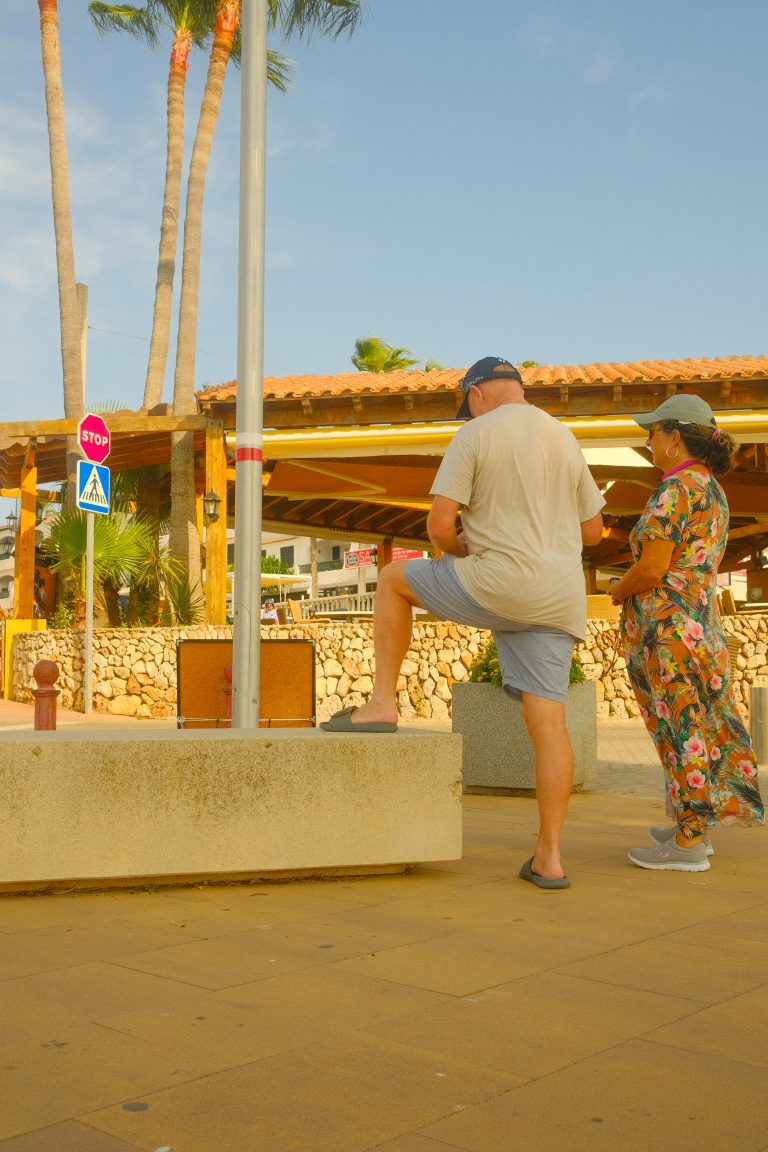 Street photo in Cala en Porter, Spain by William Read