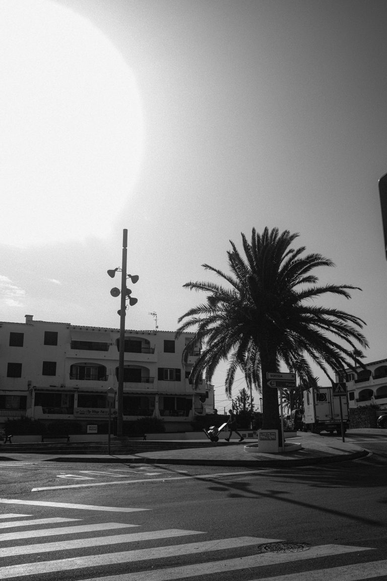 Street photo in Cala en Porter, Spain by William Read