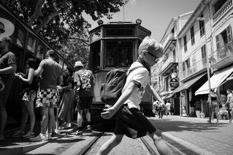 Street photo in Port de Sóller, Spain by Mike Zett