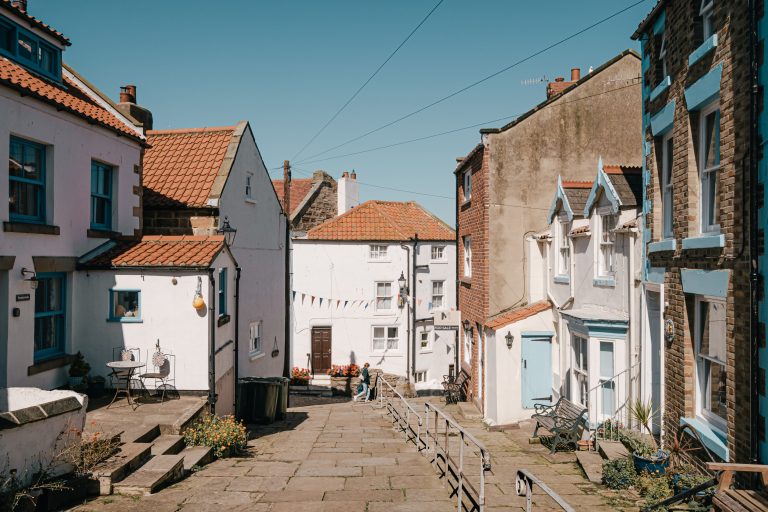 Street photo in Staithes, United Kingdom by Adam Featherstone