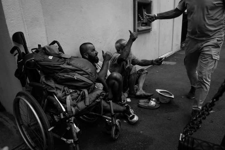 Street photo in Saint-Tropez, France by Krzysztof Hoffman