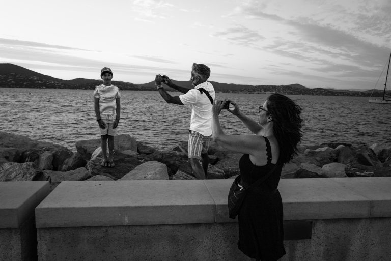 Street photo in Saint-Tropez, France by Krzysztof Hoffman
