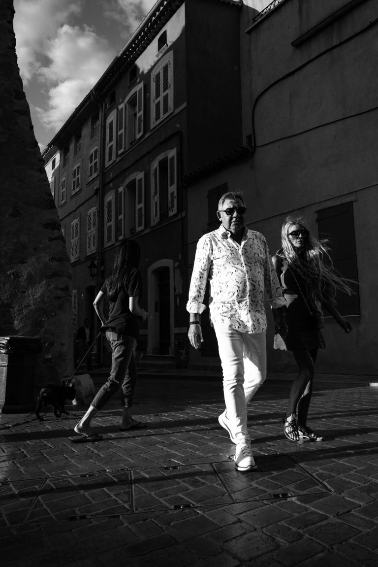 Street photo in Saint-Tropez, France by Krzysztof Hoffman
