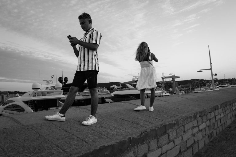 Street photo in Saint-Tropez, France by Krzysztof Hoffman