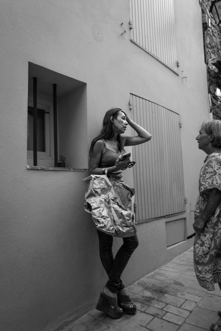 Street photo in Saint-Tropez, France by Krzysztof Hoffman