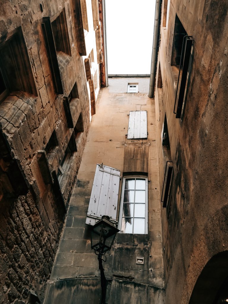 Street photo in Sarlat-la-Canéda, France by Steven Smek