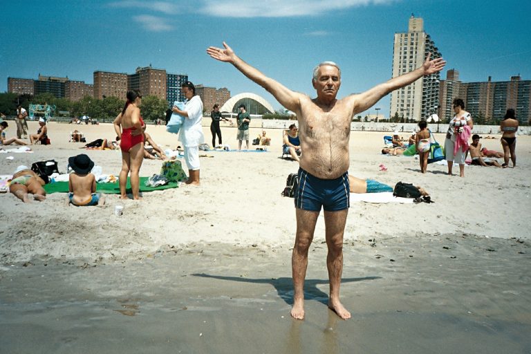 Street photo in Coney Island, United States by Vasco Roma