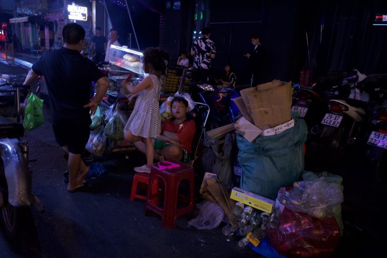 Street photo in Đ. Bùi Viện, Vietnam by Janus Jan De Guzman