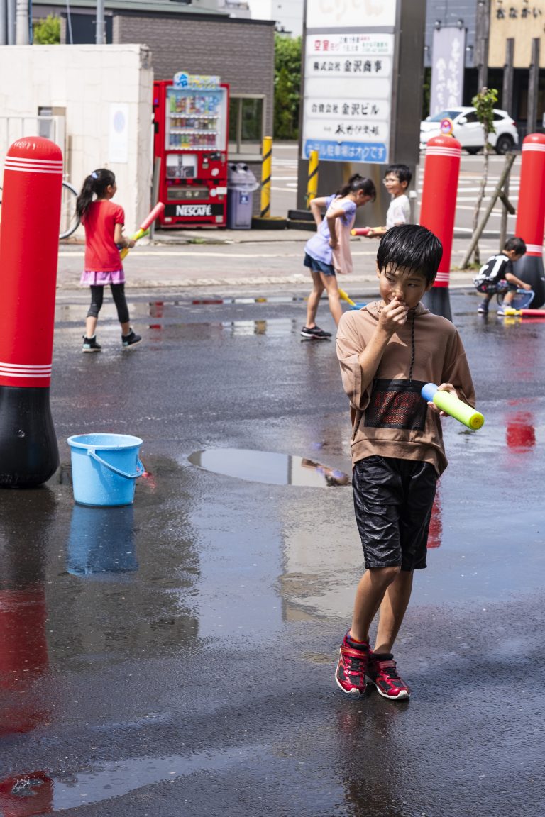 Street photo in Akita, Japan by Tiago Martino