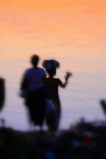 Street photo in Mandalay, Myanmar by Nik TAN