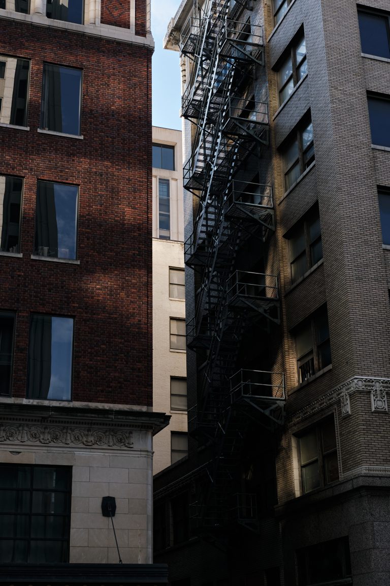 Street photo in Tulsa, United States by Sam Jage