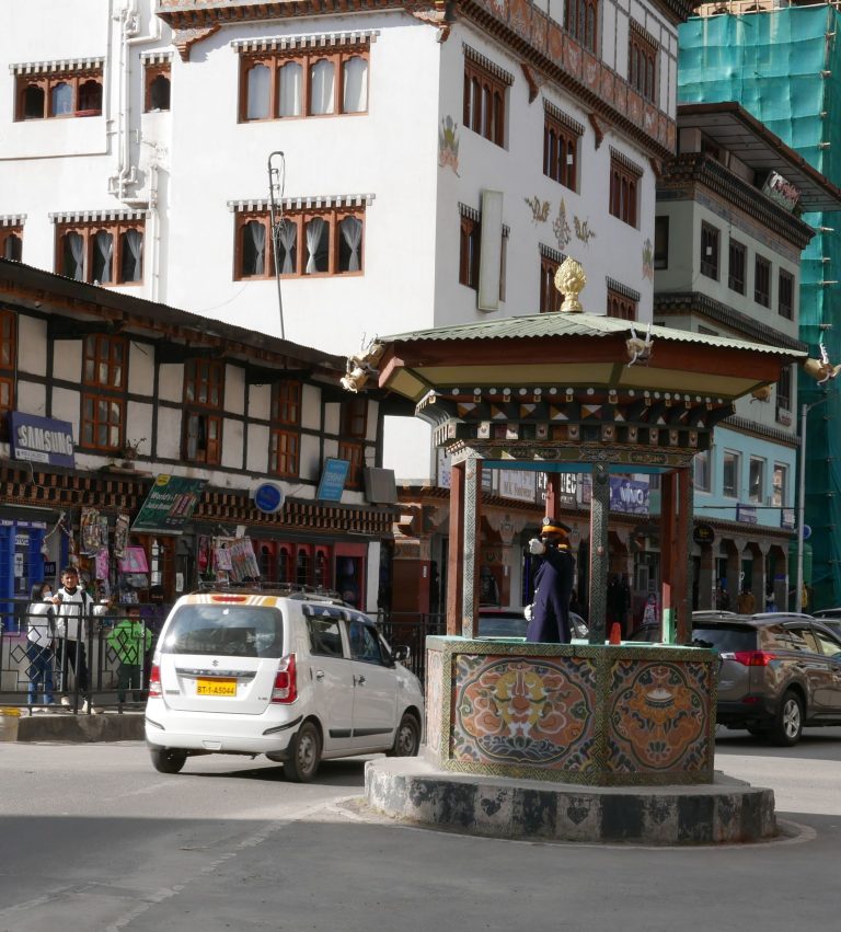 Street photo in Thimphu, Bhutan by Nik TAN