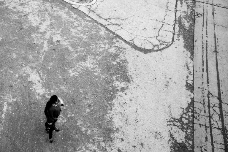 Street photo in Los Encuentros, Guatemala by Duncan Aitken
