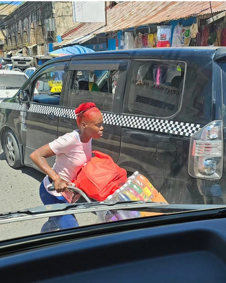Street photo in Negril, Jamaica by Phil King