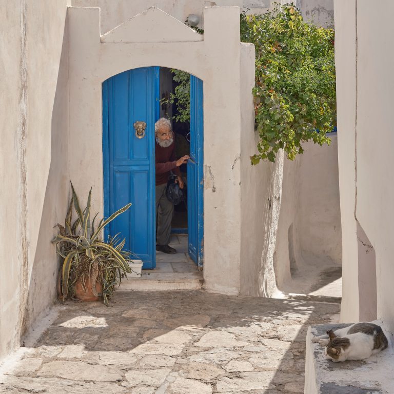 Street photo in Amorgos, Greece by John Lanagan