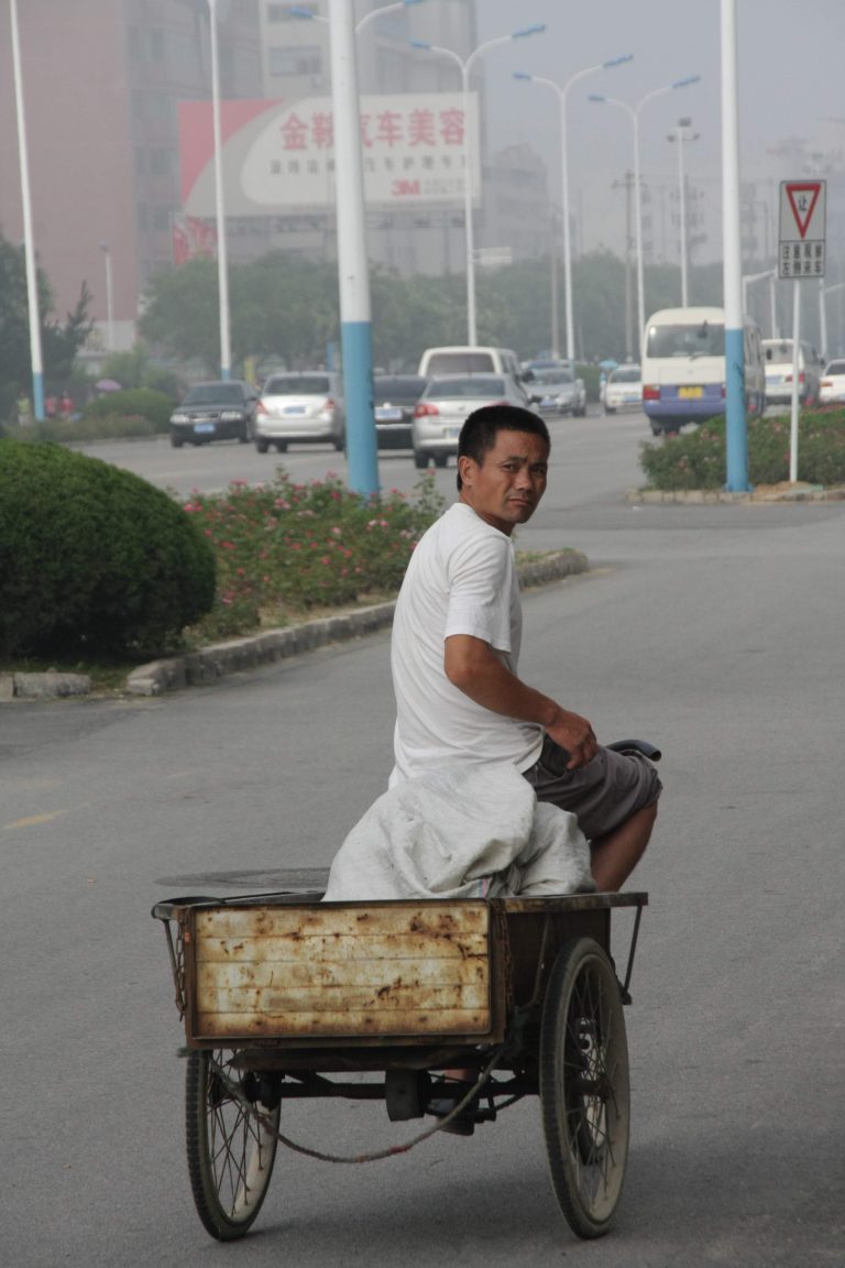 Street photo in Weihai, China by Nik TAN
