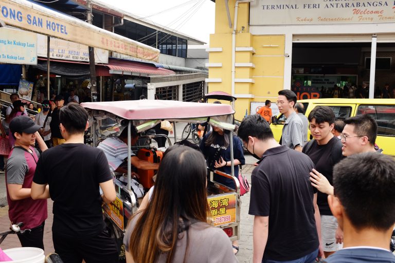 Street photo in Kukup, Malaysia by Zhi Hoong Yeap