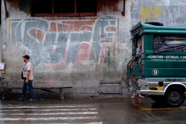 Street photo in Dumaguete, Philippines by John Matthew Mangulabnan