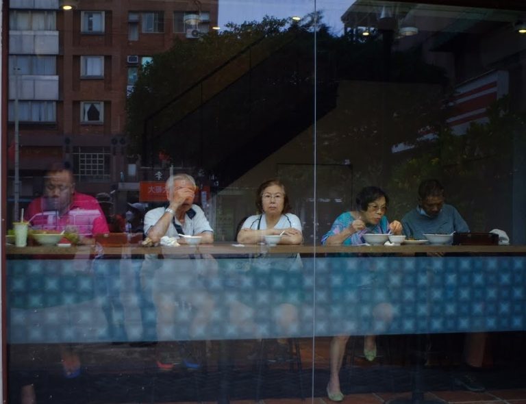 Street photo in Tamsui Fisherman's Wharf, Taiwan by Nik TAN