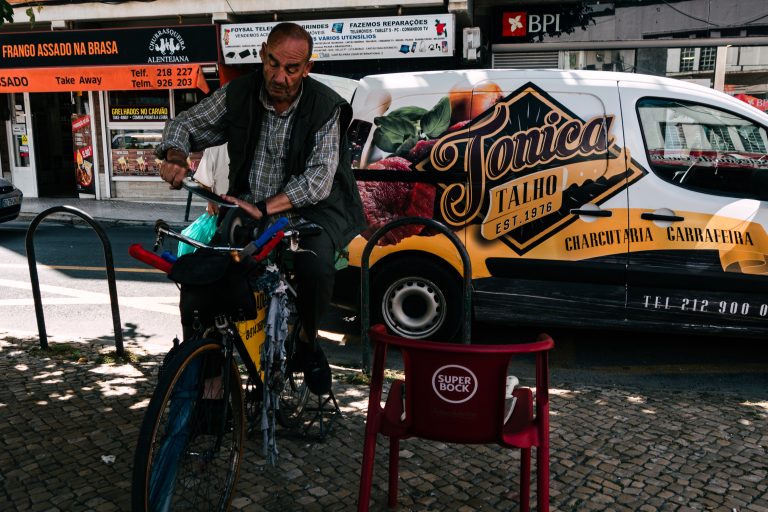 Street photo in Costa da Caparica, Portugal by Deividson Rodrigues