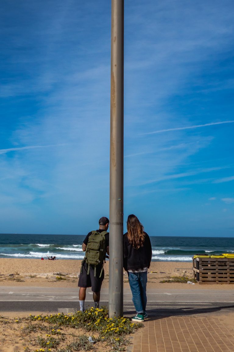 Street photo in Costa da Caparica, Portugal by Deividson Rodrigues