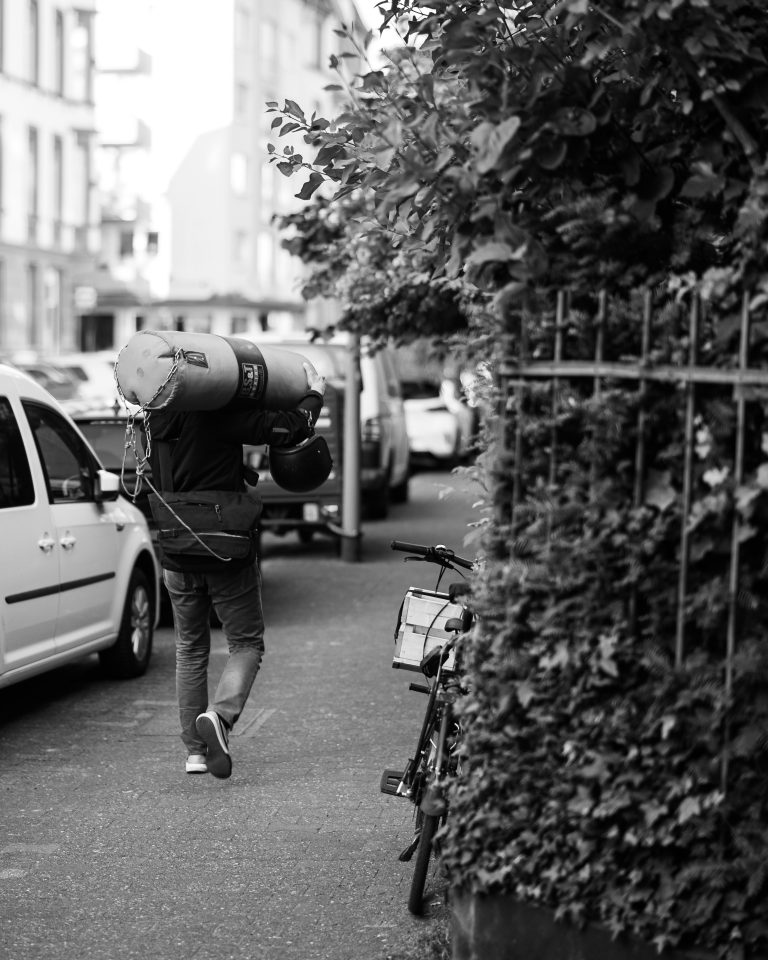 Street photo in Frankfurt, Germany by Piotr Mil