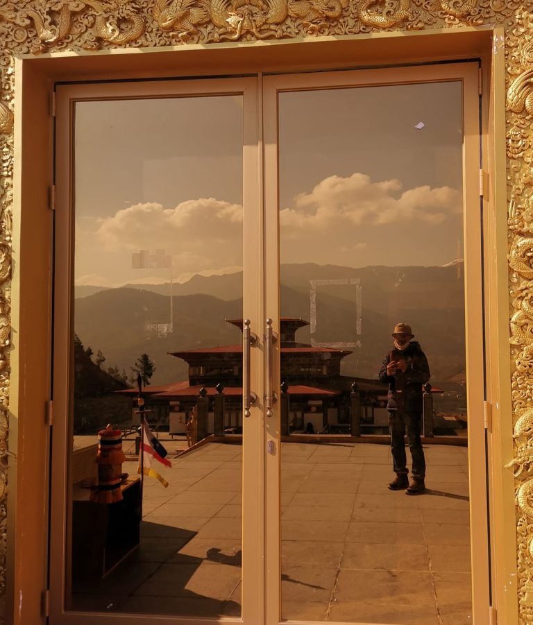 Street photo in Thimphu, Bhutan by Nik TAN