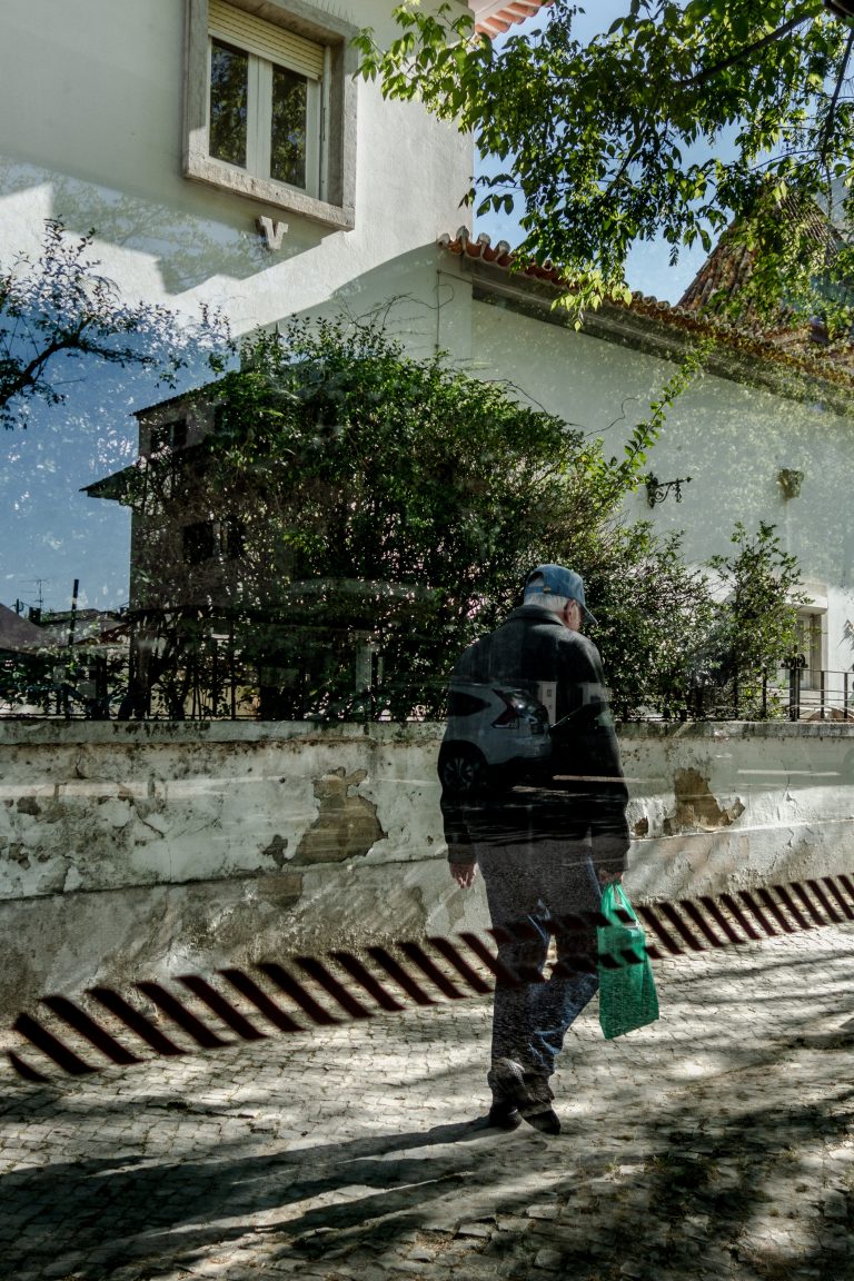 Street photo in Costa da Caparica, Portugal by Deividson Rodrigues