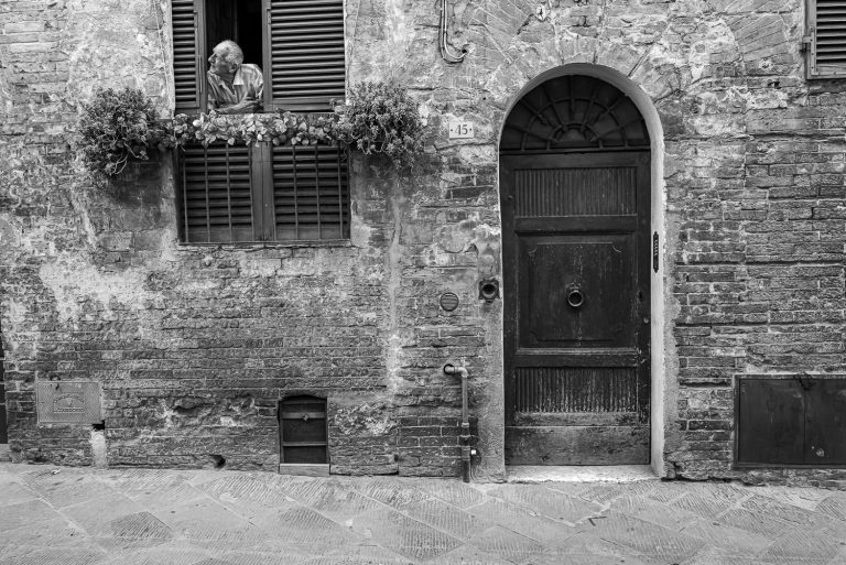 Street photo in Italy by Robert Haines