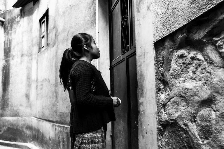 Street photo in Santa Catarina Palopó, Guatemala by Duncan Aitken