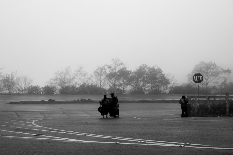 Street photo in Los Encuentros, Guatemala by Duncan Aitken