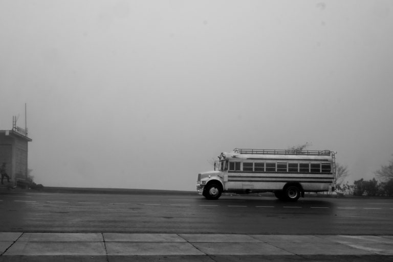 Street photo in Los Encuentros, Guatemala by Duncan Aitken