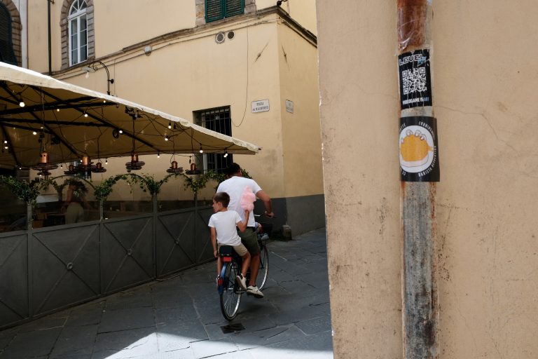 Street photo in Italy by Ian Game