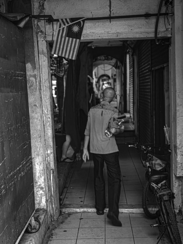 Street photo in Kuala Lumpur, Malaysia by Arnaz M. Khairul